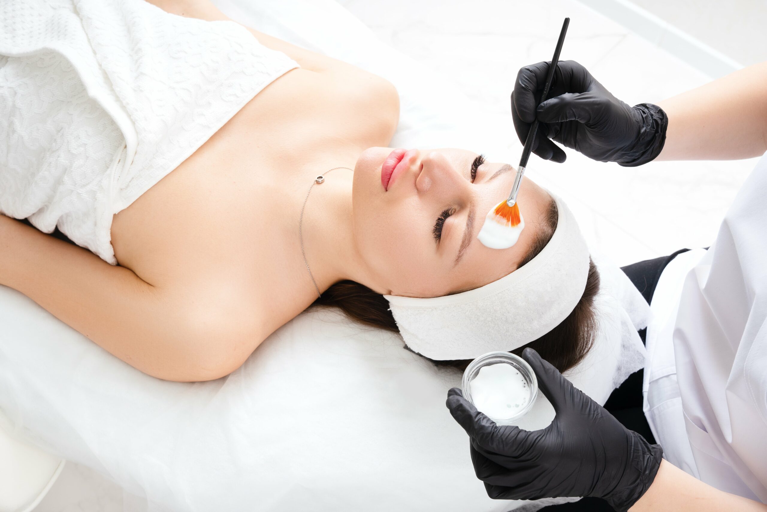 Young female getting Medical-Grade-Peel Treatment in New York, NY | Re:forma