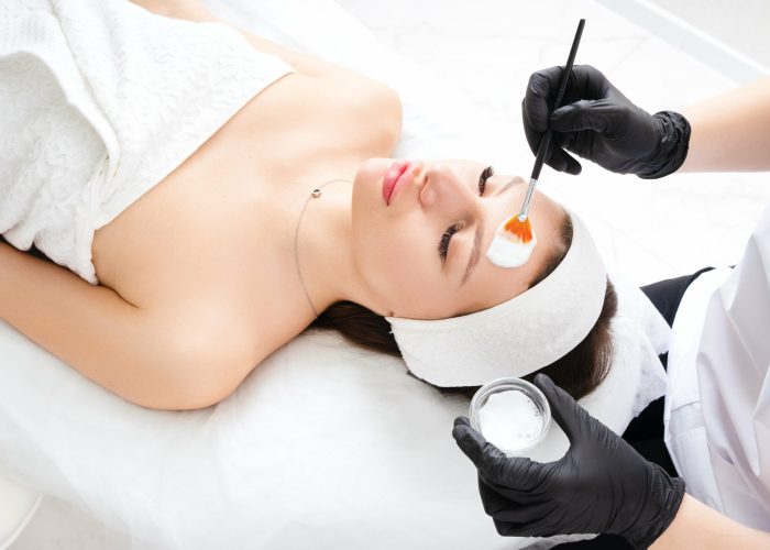 Young female getting Medical-Grade-Peel Treatment in New York, NY | Re:forma