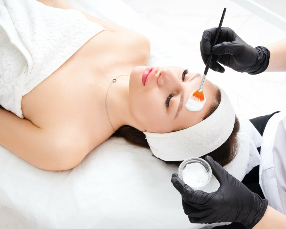 Young female getting Medical-Grade-Peel Treatment in New York, NY | Re:forma