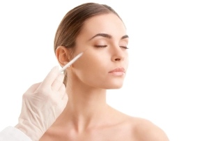 Young woman receiving botox treatment | Re:forma in New York, NY